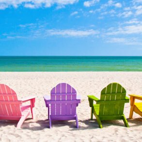 Adirondack Beach Chairs on a Sunny Vacation Beach